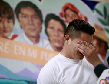 In this June 2018 photo, Christian, from Honduras, recounts his separation from his child at the border. A judge has given the federal government six months to identify children separated from their families. (Matt York/AP)