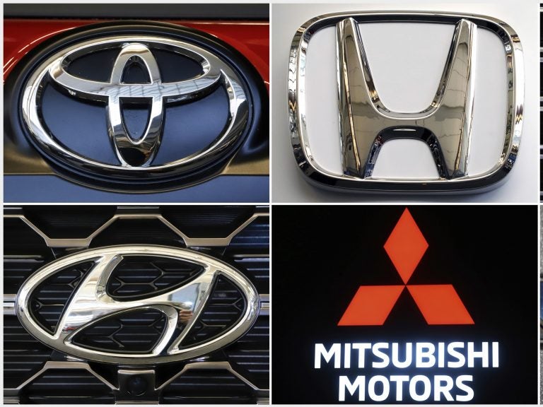 This combination of photos shows clockwise from top left the logos for Toyota, Honda, Kia, Fiat Chrysler, Mitsubishi and Hyundai. U.S. auto safety regulators have expanded an investigation into malfunctioning air bag controls to include 12.3 million vehicles because the bags may not inflate in a crash. (AP)
