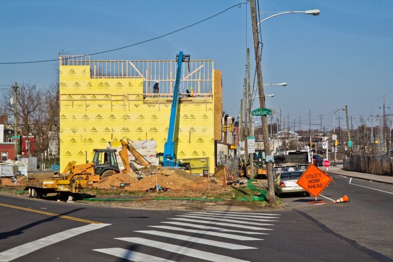 Market-rate town homes are under construction at 3300 Mantua Avenue. Councilwoman Jannie Blackwell steered the lot to the project's developer. (Kimberly Paynter/WHYY)