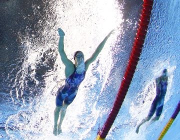 Hali Flickinger, left, of Spring Grove, York County, competes for the U.S. in a semifinal of the women's 200-meter butterfly at the Summer Olympics in Rio de Janeiro, Brazil. Flickinger placed seventh in the event’s final heat. (David J. Phillip/AP Photo)