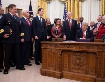 President Trump at the signing ceremony for the First Step Act in December. While some prisoners are benefiting from reduced sentences, implementation of other aspects of the law has been hit with delays.
(Jim Watson/AFP/Getty Images)