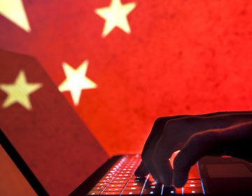 Top government leaders told NPR that federal agencies are years behind where they could have been if Chinese cybertheft had been openly addressed earlier. (Bill Hinton Photography/Getty Images)