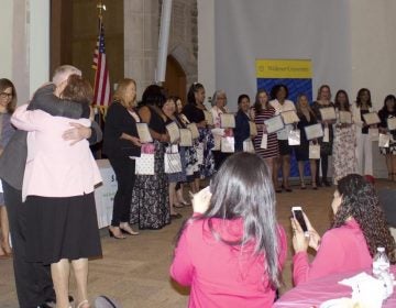 President of Finanta, Luis E. Mora Rechnitz congratulates the sixteen graduates for completing the six-week course. (Lilia Ayllón/ AL DÍA News)