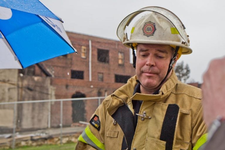 Philadelphia fire commissioner Adam Thiel at The Original Apostolic Faith Church of the Lord Jesus Christ in North Philadelphia in March of 2018, right after a fire broke out at the church. (Kimberly Paynter/WHYY)