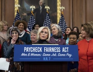 Lilly Ledbetter, center, an activist for workplace equality, speaks at an event to advocate for the Paycheck Fairness Act on the 10th anniversary of President Barack Obama signing the Lilly Ledbetter Fair Pay Act, at the Capitol in Washington, Wednesday, Jan. 30, 2019. (AP Photo/J. Scott Applewhite)