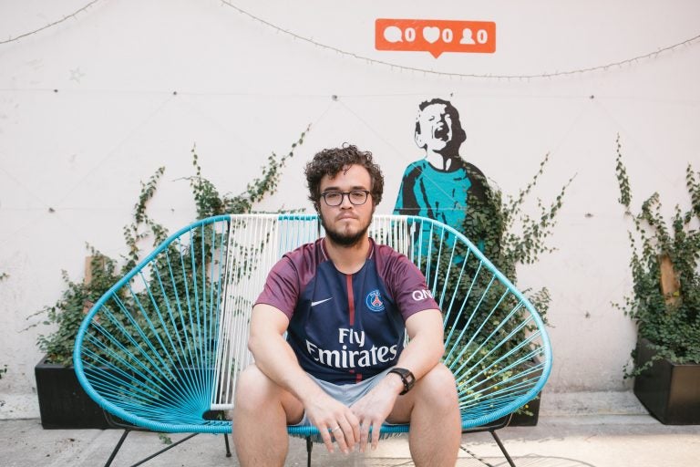 Claudio Gage poses for a portrait at the Hola Code offices in Mexico City, Mexico on May 13, 2019. Gage was deported to Mexico after having lived in the U.S. for more than a decade. (Alicia Vera for NPR)