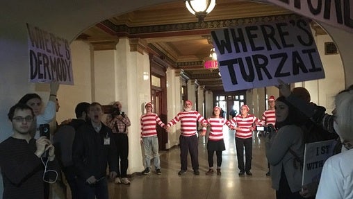 Members of the group March on Harrisburg dressed in Where's Waldo costumes in 2017, after their second march to the Capitol. They were arrested shortly after this demonstration — a common outcome for the group. (Katie Meyer/WITF)