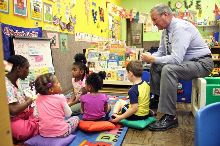 Philadelphia Mayor Jim Kenney sits in on a preschool class at Little Learners Literacy Academy in South Philadelphia in 2016. Pre-K expansion was one of Kenney's top campaign promises. (Emma Lee/WHYY)