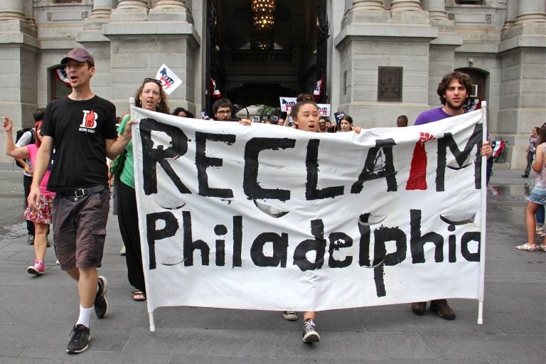 Members of Reclaim Philadelphia march through Center City prior to the Democratic National Convention in 2016 to demand that the DNC reveal its sources of funding.