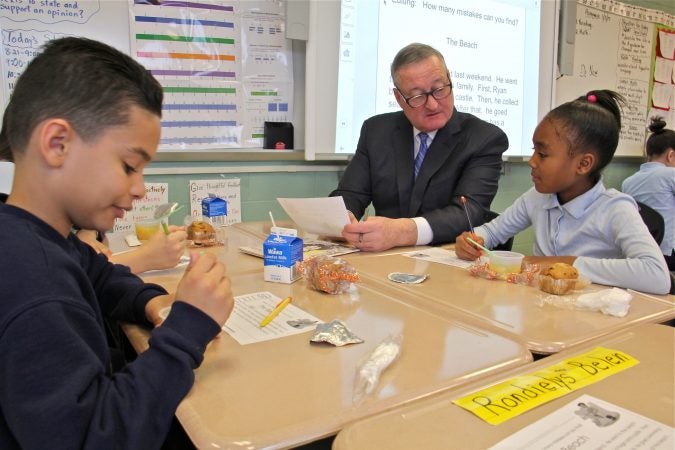 Kenney, shown here sitting down to breakfast in 2017 with fourth graders at Henry A. Brown Elementary School in Kensington. (Emma Lee/WHYY)