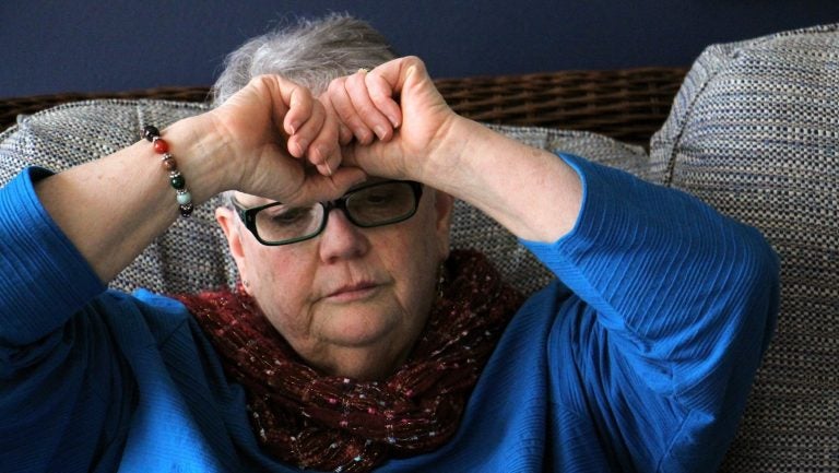 Patricia Cahill pauses to collect herself as she recounts her story of child sexual abuse in the Roman Catholic Church. (Emma Lee/WHYY)