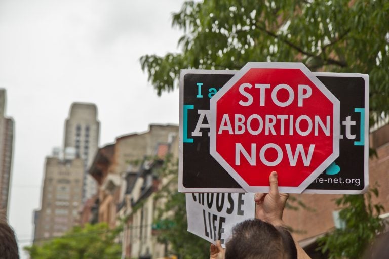 File - Protestors gathered outside the Planned Parenthood Clinic on Locust Street in Center City. (Kimberly Paynter/WHYY)