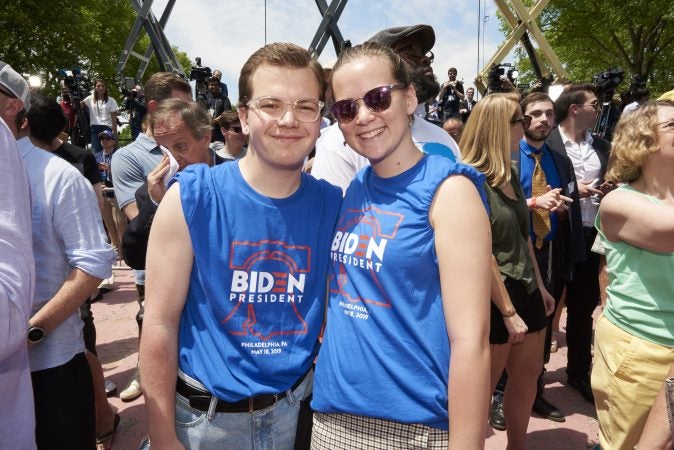 Jarod Watson and Maisie Macmullan, two Drexel students who live in Philadelphia, attend Former Vice President Joe Biden's presidential kickoff campaign rally at Eakins Oval in Philadelphia, Pa. (Natalie Piserchio for WHYY)