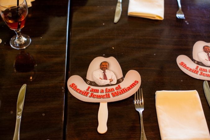 A campaign sign for current Philadelphia Sheriff Jewell Williams is pictured at Relish Tuesday afternoon during the 2019 primary election. (Brad Larrison for WHYY)