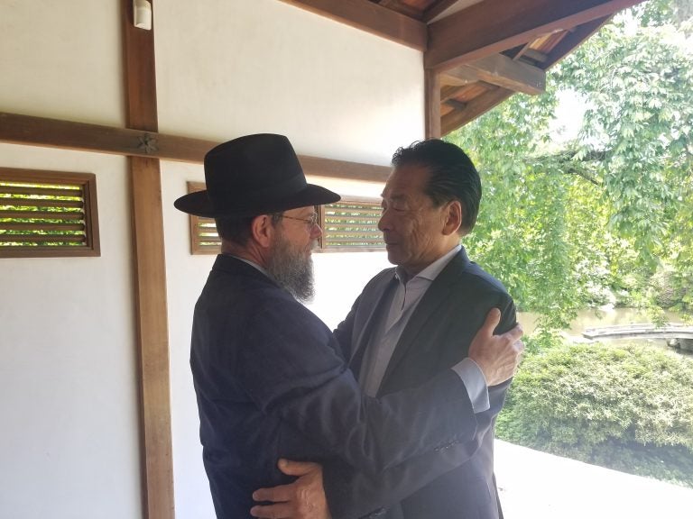 Rabbi Yossey Goldman and Nobuki Sugihara at Shofuso at the Japanese House in Philadelphia’s Fairmount Park (Peter Crimmins/WHYY)