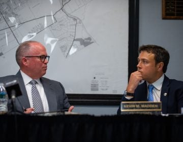 Delaware County council chairman John McBlain and council member Kevin Madden discuss a proposed measure on new ethics requirements at the Thornberry Township building in Cheyney, Pa. on Wednesday, May 29, 2019. (Kriston Jae Bethel for WHYY)