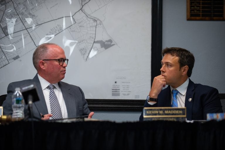 Delaware County council chairman John McBlain and council member Kevin Madden discuss a proposed measure on new ethics requirements at the Thornberry Township building in Cheyney, Pa. on Wednesday, May 29, 2019. (Kriston Jae Bethel for WHYY)