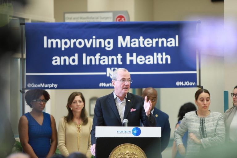 Governor Phil Murphy signs legislation on maternal health joined by First Lady Tammy Murphy, legislators, Newark mayor Was Baraka, and community leaders at University hospital on Wednesday May 8, 2019. (Courtesy of Edwin J. Torres/Governor's Office)