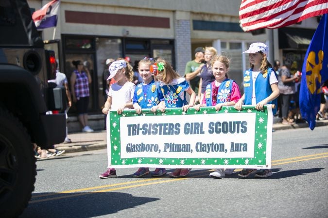 Girl Scouts marching in the Memorial Day parade in Glassboro. (Miguel Martinez/WHYY)