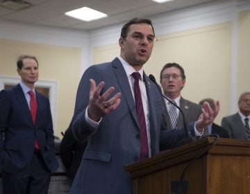 Rep. Justin Amash, R-Mich., (center), is joined by, (from left), Sen. Ron Wyden, D-Ore., Rep. Thomas Massie, R-Ky., and Rep. Ralph Norman, R-S.C., as he hosts a news conference with a bipartisan group of House and Senate lawmakers who are demanding the U.S. government should be required to seek warrants if it wants to search for information about Americans and insist on reforms to the FISA Amendments Reauthorization Act of 2017 to protect Americans' rights, at the Capitol in Washington, Wednesday, Jan. 10, 2018. (J. Scott Applewhite/AP Photo)