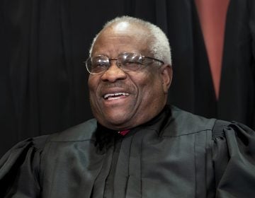 In this Nov. 30, 2018, file photo, Supreme Court Associate Justice Clarence Thomas, appointed by President George H. W. Bush, sits with fellow Supreme Court justices for a group portrait at the Supreme Court Building in Washington. Thomas is now the longest-serving member of a court that has recently gotten more conservative, putting him in a unique and potentially powerful position, and he’s said he isn’t going away anytime soon. (J. Scott Applewhite/AP Photo, File)