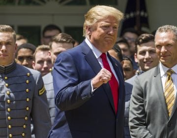 President Donald Trump pumps his fist as he departs after the presentation of the Commander-in-Chief's Trophy to the U.S. Military Academy at West Point football team, in the Rose Garden of the White House, Monday, May 6, 2019, in Washington. (Alex Brandon/AP Photo)