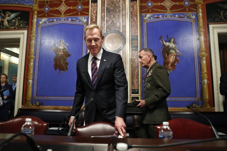 Acting Defense Secretary Patrick Shanahan, (left), and Joint Chiefs Chairman Gen. Joseph Dunford, arrive to testify at a Senate Appropriations subcommittee hearing on the defense budget, Wednesday May 8, 2019, on Capitol Hill in Washington. (Jacquelyn Martin/AP Photo)