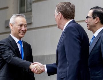 Treasury Secretary Steve Mnuchin, (right), and United States Trade Representative Robert Lighthizer, (center), greet Chinese Vice Premier Liu He as he arrives at the Office of the United States Trade Representative in Washington, Friday, May 10, 2019 for trade talks between the United States and China. (Andrew Harnik/AP Photo)