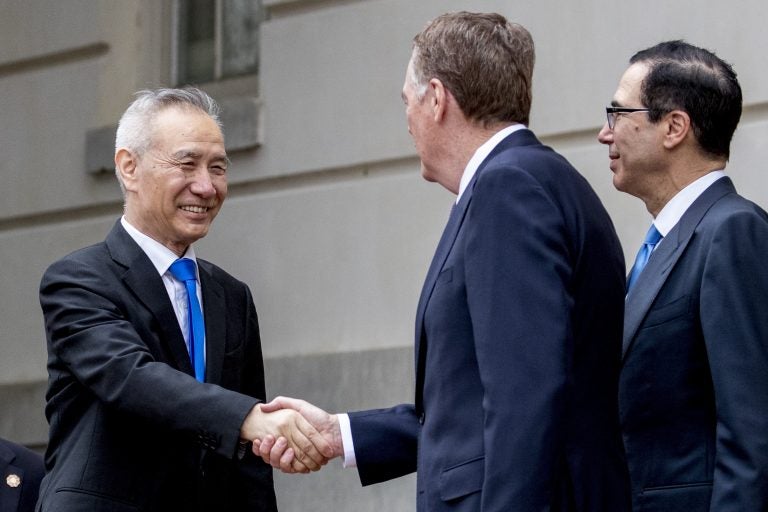 Treasury Secretary Steve Mnuchin, (right), and United States Trade Representative Robert Lighthizer, (center), greet Chinese Vice Premier Liu He as he arrives at the Office of the United States Trade Representative in Washington, Friday, May 10, 2019 for trade talks between the United States and China. (Andrew Harnik/AP Photo)