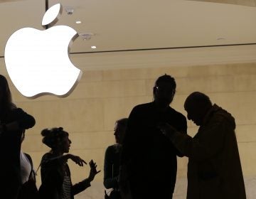 In this May 31, 2018, file photo customers enter the Apple store in New York. The Supreme Court is allowing consumers to pursue an antitrust lawsuit that claims Apple has unfairly monopolized the market for the sale of iPhone apps. (Mark Lennihan/AP Photo)