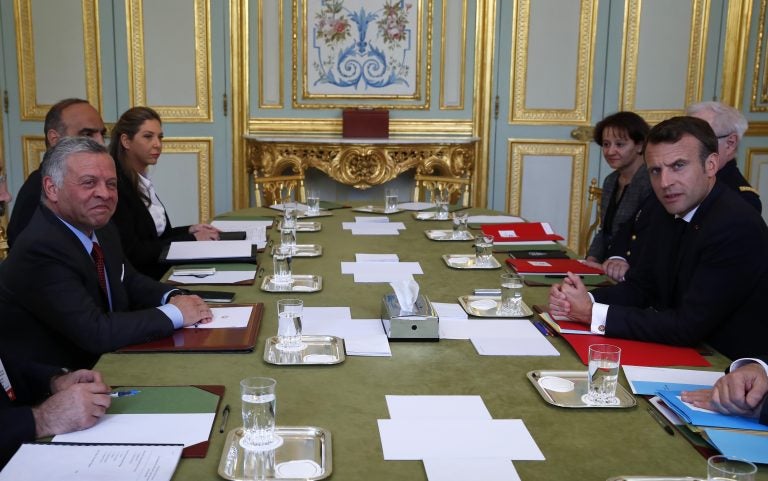 French President Emmanuel Macron, (right), talks with Jordan's King Abdullah, (left), at the Elysee Palace, Wednesday, May 15, 2019 in Paris. Several world leaders and tech bosses are meeting in Paris to find ways to stop acts of violent extremism from being shown online. (Francois Mori/AP Photo, Pool)