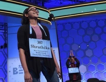 Shruthika Padhy, 13, of Cherry Hill, N.J., reacts after realizing she is one of eight co-champions of the 2019 Scripps National Spelling Bee in Oxon Hill, Md., Friday, May 31, 2019. (Susan Walsh/AP Photo)