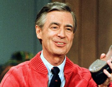 This June 28, 1989 file photo shows Fred Rogers as he rehearses the opening of his PBS show 
