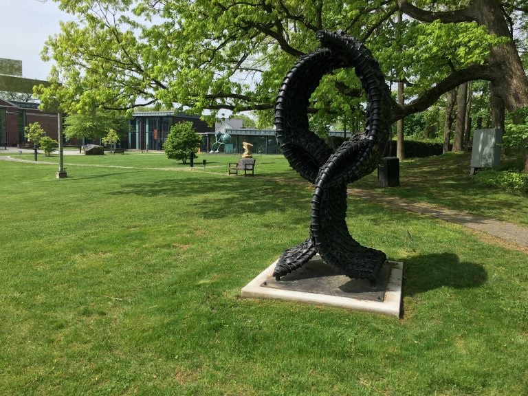 The sculpture “One Way” by Chakaia Booker is the first work by an African American artist to be installed at the Delaware Art Museum’s outdoor Copeland Sculpture Garden. (Mark Eichmann/WHYY)