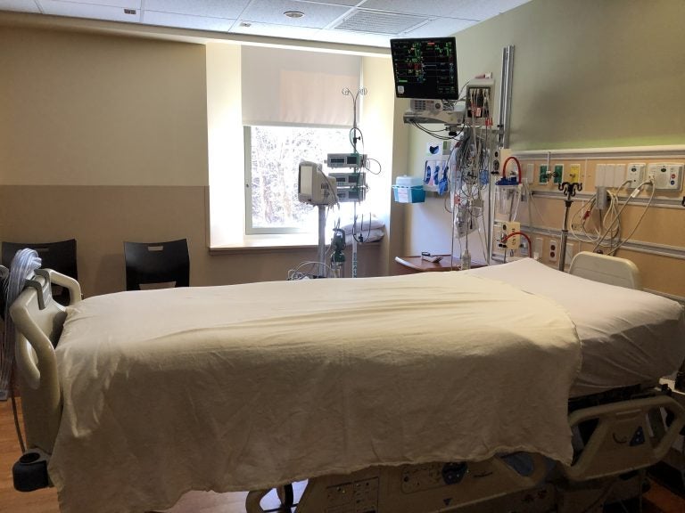 Inside the negative pressure isolation room at St. Luke’s University Hospital. Vent in the upper right filters contaminated air in the room. (Christine Fennessy for WHYY)