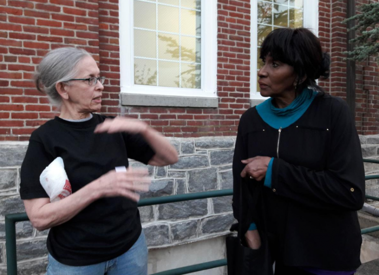 Lansdowne residents talk after a town hall meeting on Thursday about plans for a methadone treatment center on Union Avenue in Upper Darby (Samaria Bailey/The Philadelphia Tribune)