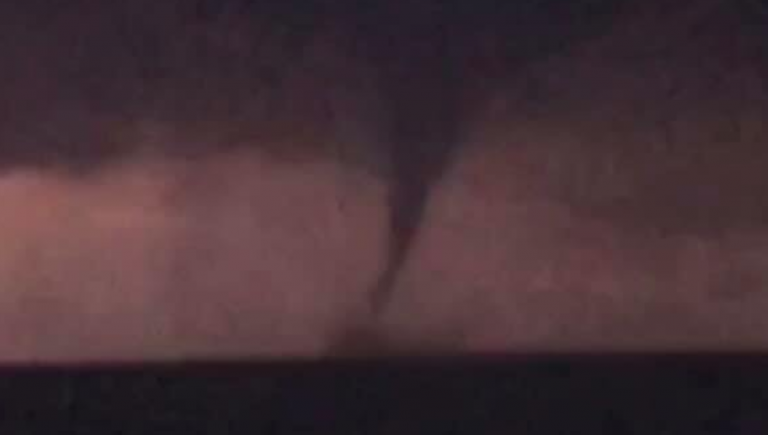 Bonanza II crew member James Dawson captured this image of a waterspout in the Delaware Bay off Cumberland County Tuesday evening. The waterspout is illuminated by lightning. (Image courtesy of Bonanza II)