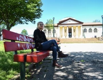 Chera Kowalski sits on a bench outside of McPherson Square Library on April 27, 2019. In 2017, when Kowalski was working as a librarian at McPherson, she convinced the Free Library of Philadelphia to offer overdose reversal training to employees. (Erin Blewett/Kensington Voice)
