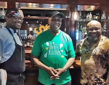 From left, Chefs Elijah Milligan, Carl Lewis, and Yusef McCoy at the Black Restaurant Week 2019 preview event held at Drexel University's Academic Bistro on May 20. (TrenaeNuri/WHYY) 