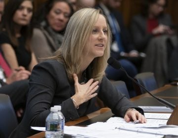 Kathy Kraninger, director of the Consumer Financial Protection Bureau, says in a letter that the Department of Education is getting in the way of efforts to police the student loan industry. (J. Scott Applewhite/AP)