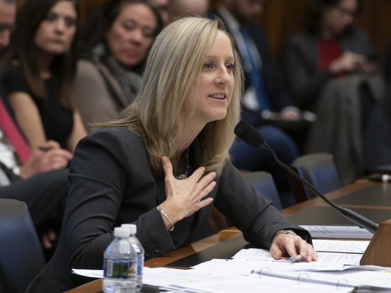 Kathy Kraninger, director of the Consumer Financial Protection Bureau, says in a letter that the Department of Education is getting in the way of efforts to police the student loan industry. (J. Scott Applewhite/AP)