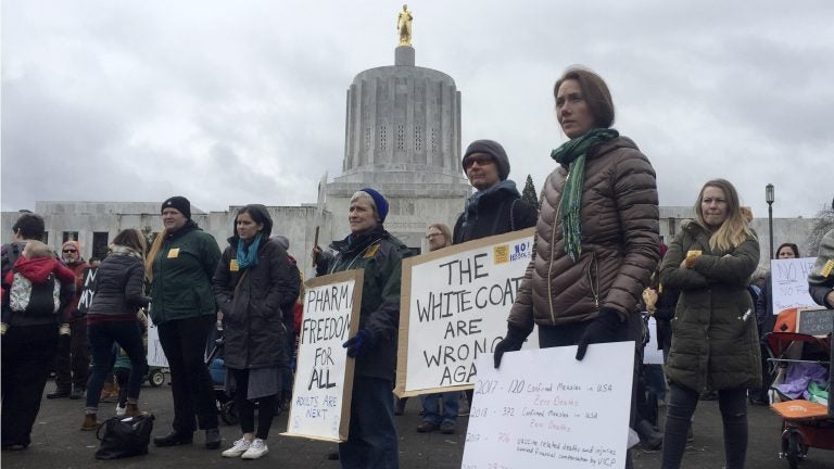 Hundreds of people rally in March at the Oregon State Capitol in Salem, protesting a proposal to tighten school vaccine requirements Similar rallies were held in April (Sarah Zimmerman/AP)