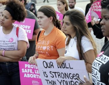 Demonstrators listen to speeches during a rally in support of abortion rights on Thursday in Miami. (Lynne Sladky/AP Photo)