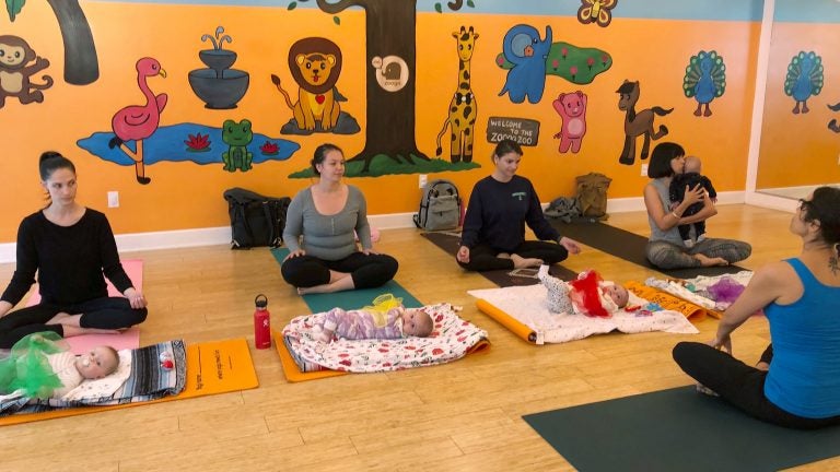 In 2018, U.S. birthrates fell for nearly all racial and age groups, the CDC says. Here, mothers and babies attend a yoga class in Culver City, Calif., in March. (Jane Ross/Reuters)