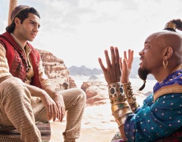 In the live-action ‘Aladdin,’ Mena Massoud stars Aladdin, while Will Smith plays the Genie.  Daniel Smith/Walt Disney Pictures
