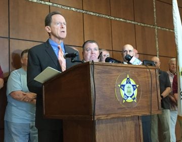 Pennsylvania Senator Pat Toomey has reintroduced the Thin Blue Line Act. Some say it will bring justice for slain cops. Others think it’s an empty political gesture. (Avi Wolfman-Arent/WHYY)