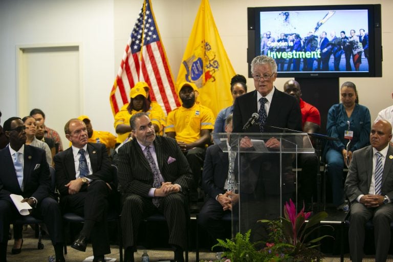 Former New Jersey Gov. Jim Florio speaks in Camden Thursday about the controversial tax break some businesses have gotten to relocate to the city. (Miguel Martinez/WHYY)