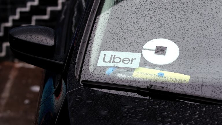 Uber announced this week that it is changing policies and banning riders with low scores. (Justin Sullivan/Getty Images)