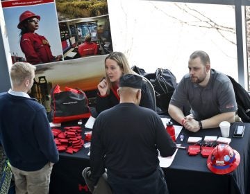 In this March 7, 2019, file photo visitors to the Pittsburgh veterans job fair meet with recruiters at Heinz Field in Pittsburgh.
(Keith Srakocic/AP Photo)