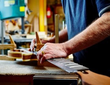 Having a purpose in life, whether building guitars or swimming or volunteer work, affects your health, researchers found. It even appeared to be more important for decreasing risk of death than exercising regularly. (Dean Mitchell/Getty Images)